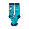 Crew socks in teal featuring illustrations of unicorns, mermaids, and ocean scenes. Text reads 'Kinda Salty'.