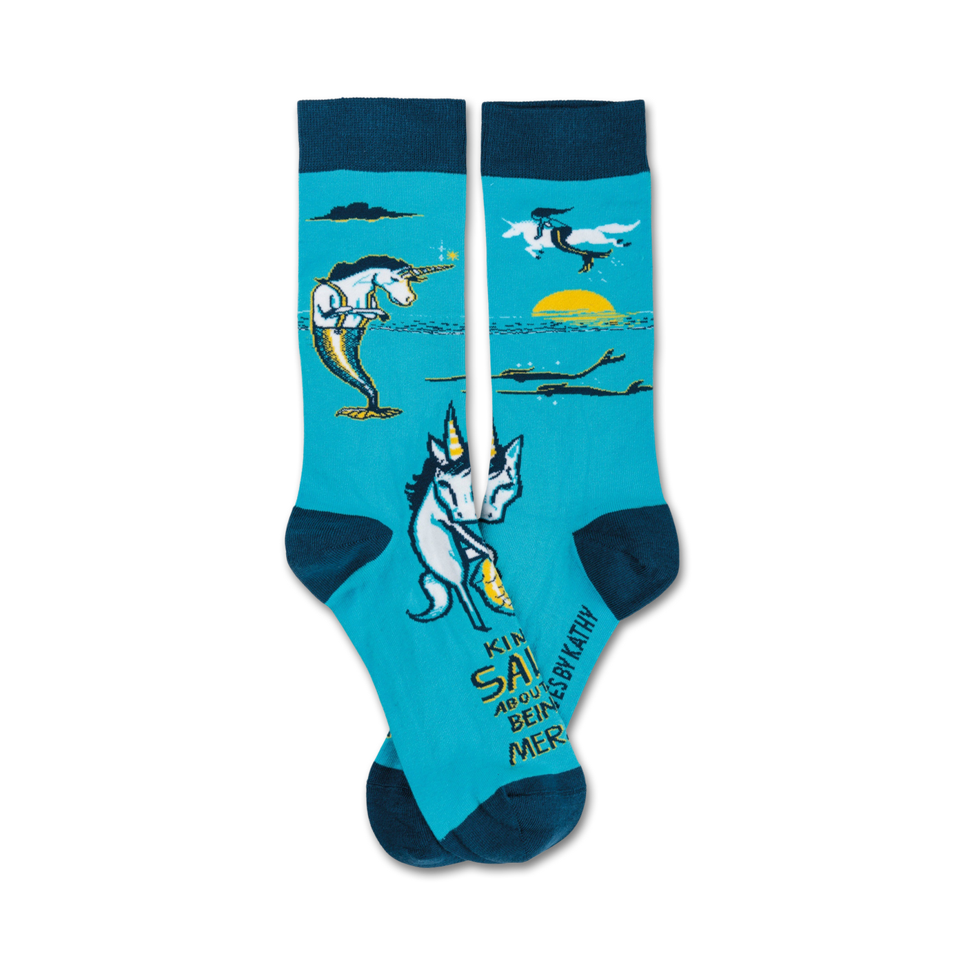 Crew socks in teal featuring illustrations of unicorns, mermaids, and ocean scenes. Text reads 'Kinda Salty'.