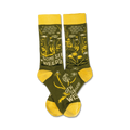 Pair of olive green crew socks with yellow accents. Features a dandelion and wildflower design and the text 'Some See Weeds'.