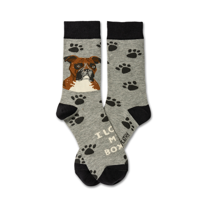 gray crew socks with black paw prints and a brown boxer dog face surrounded by the words 