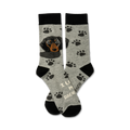A pair of grey crew socks with black paw prints and a black and tan Dachshund image. Text reads 'I Love My Dachshund'.