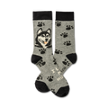 A pair of grey crew socks with a husky's face and paw prints. The words 'I Love My Husky' are visible on the bottom.