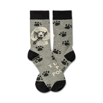 Pair of crew socks, grey with black paw prints and a black and white poodle image. Text reads 'I Love My Poodle'.
