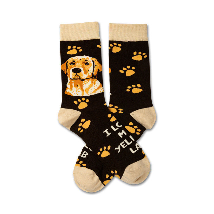 black crew socks with brown paw prints, a picture of a yellow labrador retriever, and the phrase 