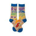 Crew socks in beige with royal blue cuffs.  The design includes colorful illustrations of cooking utensils and food, along with the text 'Cooking Is Art'.