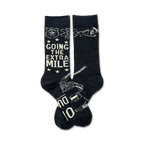 Pair of navy blue crew socks with white first responder icons (police badge, EMT star of life, firefighter helmet) and the text 'Going the Extra Mile'.