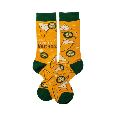 Crew socks in mustard yellow with a nacho pattern, including tortilla chips, cheese, and jalapeños.  Cuffs are dark green.