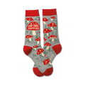 A pair of crew socks in grey with red mushroom designs and the text 'Shii-Take Happens'. Red cuffs.