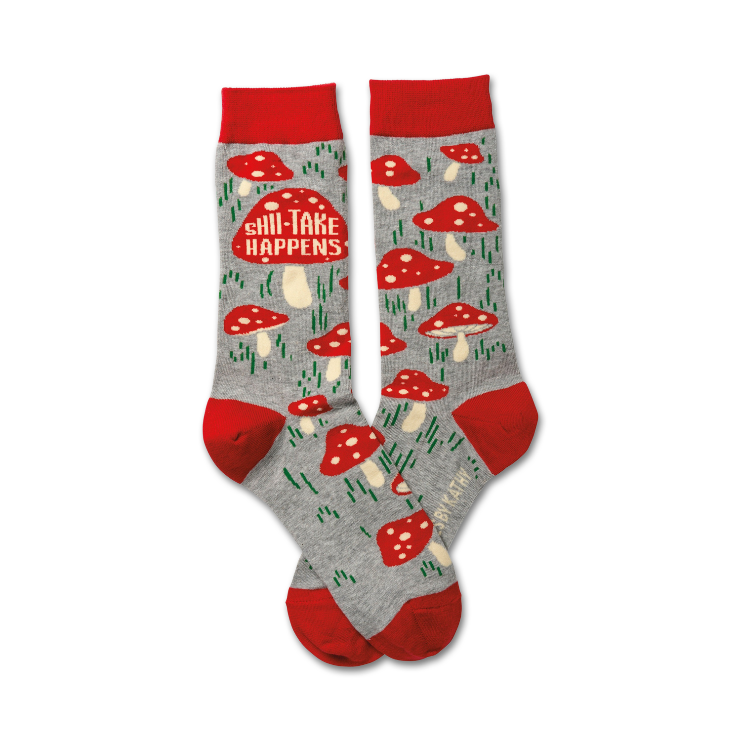 A pair of crew socks in grey with red mushroom designs and the text 'Shii-Take Happens'. Red cuffs.