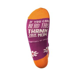 A pair of orange and purple socks with the text 