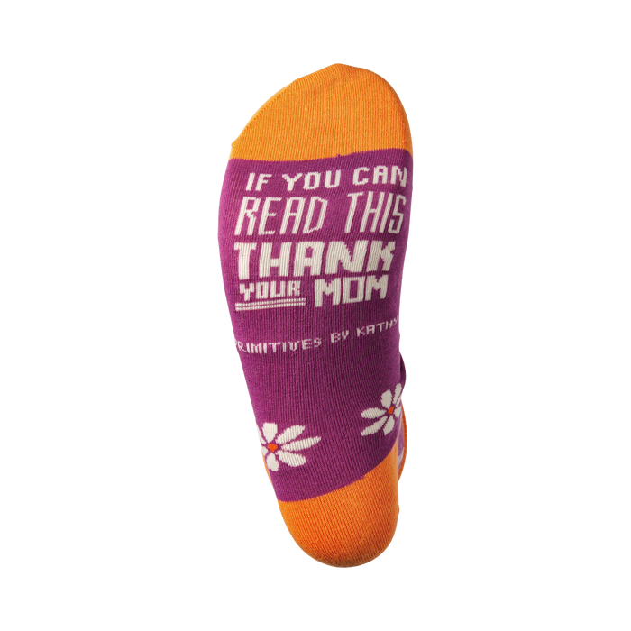 A pair of orange and purple socks with the text 