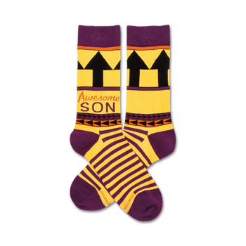 Pair of crew socks in yellow and purple.  The socks have black upward arrows, tribal-inspired accents, and the words 'Awesome Son'.