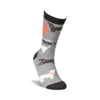 Lifestyle shot of 'Awesome Dog Mom' socks on a model's foot, showing the sock's fit and design.