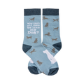 Crew socks in light blue with a grey dog pattern. Text on the sock reads: Why can't all men be like my Dog?