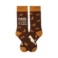 Crew socks in dark brown and mustard yellow.  A repeating pattern of small dog silhouettes is visible. The text "OMG I forgot to have kids" is printed on the socks.
