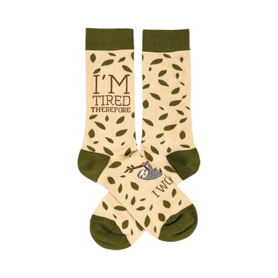 Cream-colored crew socks with olive green cuffs. Features a sleepy sloth and the phrase 'I'm Tired Therefore I Will'.