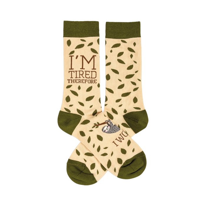 Cream-colored crew socks with olive green cuffs. Features a sleepy sloth and the phrase 'I'm Tired Therefore I Will'. }}