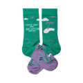 Crew socks in teal green and lavender purple.  Design includes a beach scene with a palm tree, sun, and a person surfing.