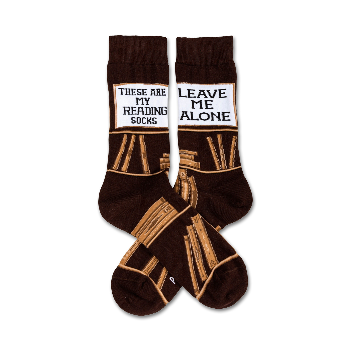 Pair of brown crew socks with a tan book stack design and a white label reading 'These Are My Reading Socks' and 'Leave Me Alone'.