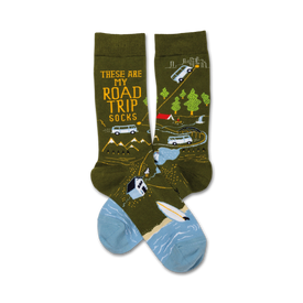 green crew socks with black text reading "these are my road trip socks," yellow car, van, tent, campfire, trees, mountains, and surfboard graphics.   