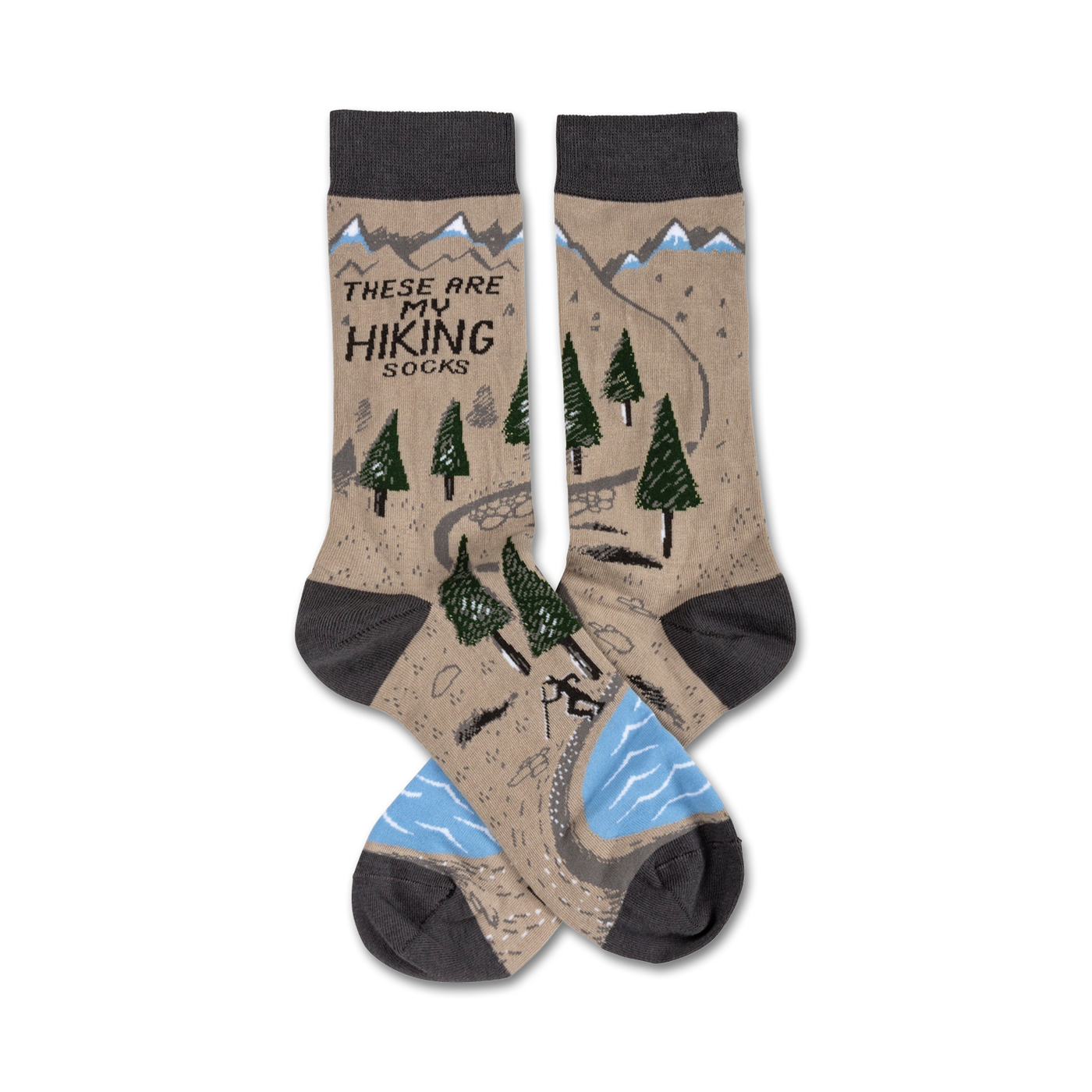 Pair of crew hiking socks. Tan background with a trail, trees, mountains, and a small hiker graphic.  Grey cuffs and light blue water detail.