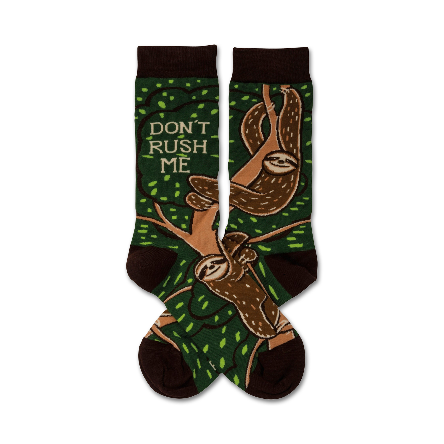 A pair of crew socks with sloths hanging from tree branches on a green background.  The socks are brown and green, and feature the text 'Don't Rush Me'.