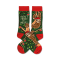 Crew socks in red and green featuring sloths wearing Santa hats on a green background with a 'Don't Hurry, Be Merry' message.