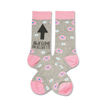 heather grey crew socks with pink cuff, toes and heel with a pattern of flowers and the text awesome bachelorette on the leg with an arrow pointing up