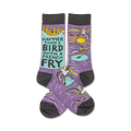 Purple crew socks with a design of birds stealing french fries and the text 'Happier than a bird with a french fry'.