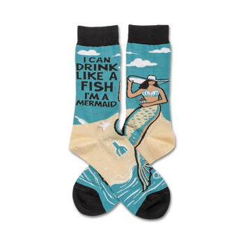  blue crew socks with a picture of a mermaid drinking a martini on the front. words on the top of the socks read "i can drink like a fish i'm a mermaid".  