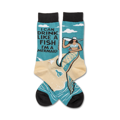  blue crew socks with a picture of a mermaid drinking a martini on the front. words on the top of the socks read "i can drink like a fish i'm a mermaid".  