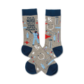 Crew socks in grey and navy blue, showcasing a nurse superhero graphic, medical tools, and the phrase 'I'm a Nurse, what's your superpower?'