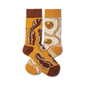 brown bacon and yellow eggs on a white background in a crew length sock for men and women.   