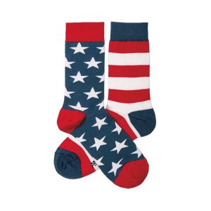 A pair of crew socks. One navy blue with white stars, red cuff/heel/toe. The other red and white stripes, navy cuff/heel/toe.