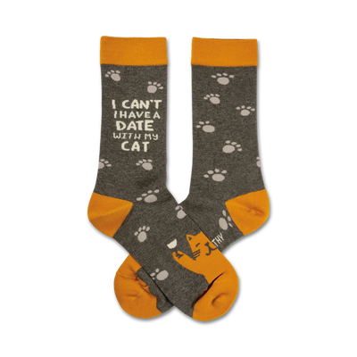 gray crew socks with orange cuff and heel. white cat paw prints and words 'i can't...i have a date with my cat' in orange on the front.  