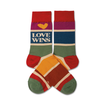 Pair of crew socks in rainbow stripes; red, purple, blue, green, yellow, orange, and cream.  Features 'LOVE WINS' text and a yellow heart.