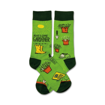 women's awesome gardener crew socks with a green backdrop and a design that features gardening tools and plants.  