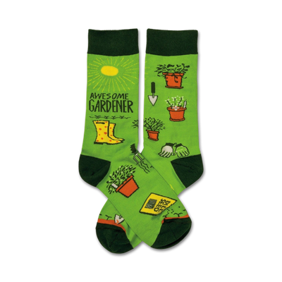 women's awesome gardener crew socks with a green backdrop and a design that features gardening tools and plants.  