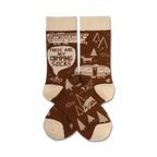 Brown and beige crew socks with a camping theme.  Design includes camper vans, trees, tents, and the text 'These Are My Camping Socks'.
