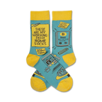 Crew socks in teal and yellow.  Feature funny illustrations of working from home, including a laptop, cat, and sticky notes.