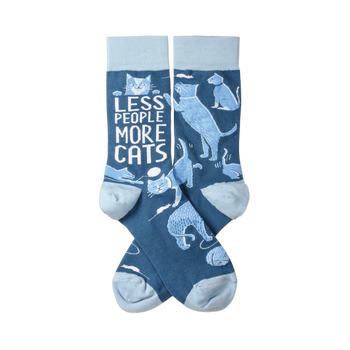 A pair of crew socks in dark blue with light blue heels, toes, and cuffs, featuring various light blue cats and white text.