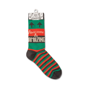 A pair of green socks with red and brown stripes and the words 