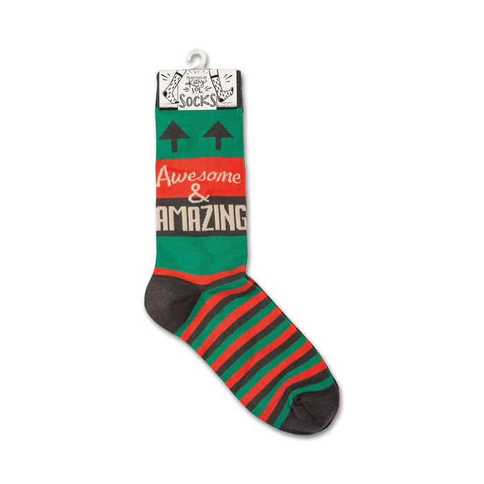 A pair of green socks with red and brown stripes and the words 