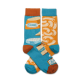 Pair of crew socks in teal and orange, featuring illustrations of macaroni and cheese, brie, cheddar, and gruyere.