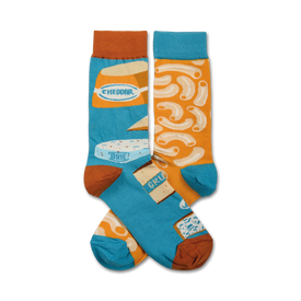 blue crew socks with orange toes and cuffs, featuring a pattern of macaroni and cheese.   