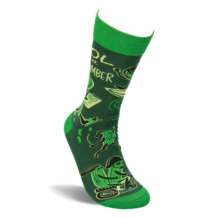 Single molded crew sock with deep green background, bright green accents, and a pattern of animated cucumbers.