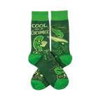 Pair of crew socks with deep green background, bright green cuffs, heels, toes, and cucumbers reading, surfing, on motorcycles.