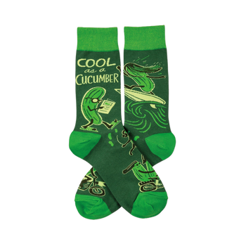 Pair of crew socks with deep green background, bright green cuffs, heels, toes, and cucumbers reading, surfing, on motorcycles.