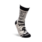 Single grey crew sock with "SORRY I'M LATE! I SAW A DOG" text and dog pattern, worn on a foot with a black stand on a white background.