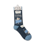 Close-up shot of a single 'I'd Rather Be Sleeping' sock hanging on a retail display hook.